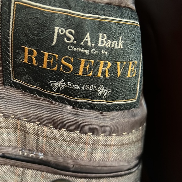 Selling a Jos A Banks brown plaid jacket in good shape. - Picture 3 of 3